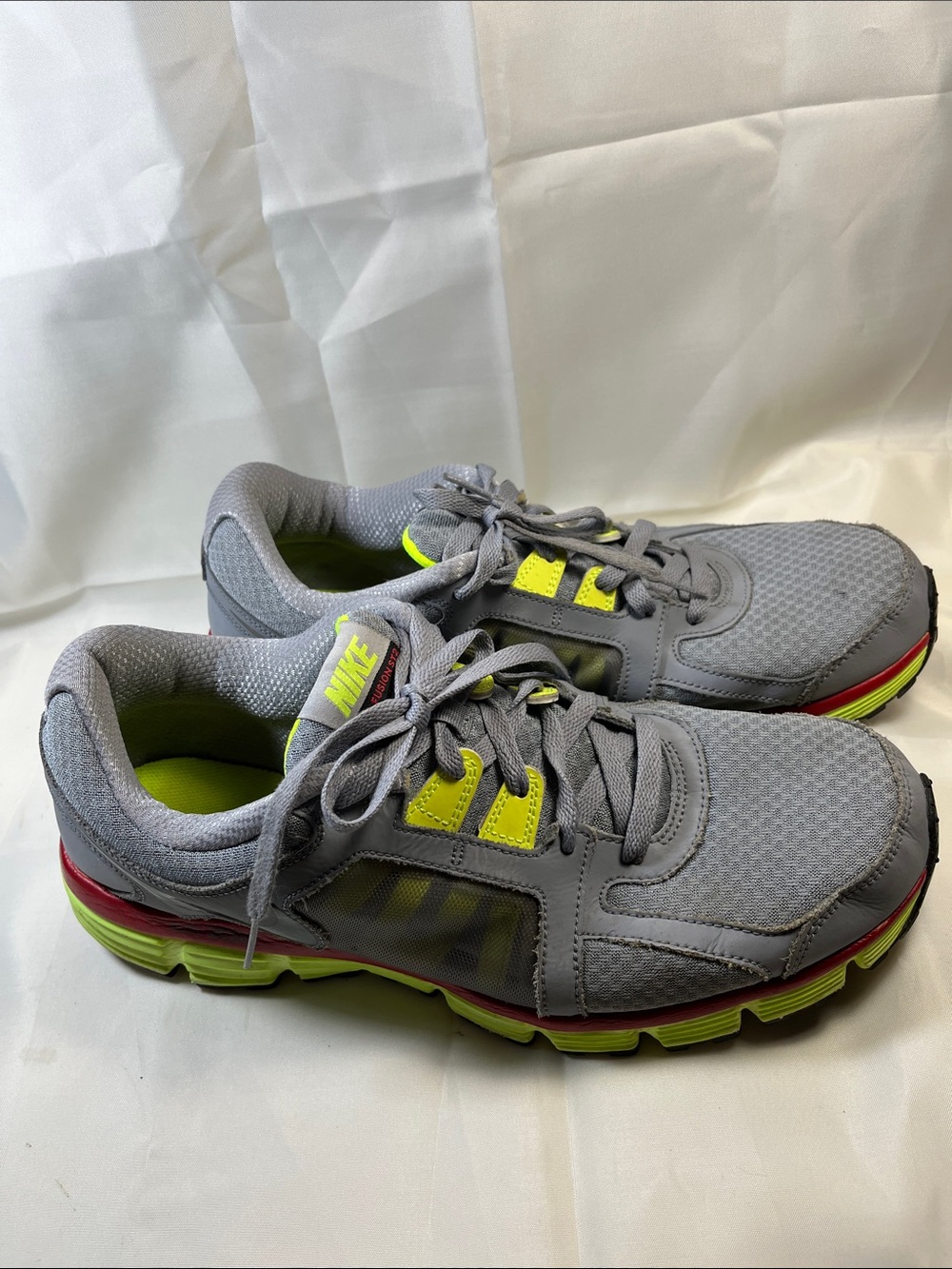 Nike Gray Athletic Running Shoes with Neon Yellow Accents